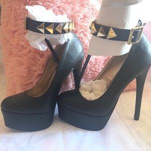 Black high heeled ankle strap round toe date pumps